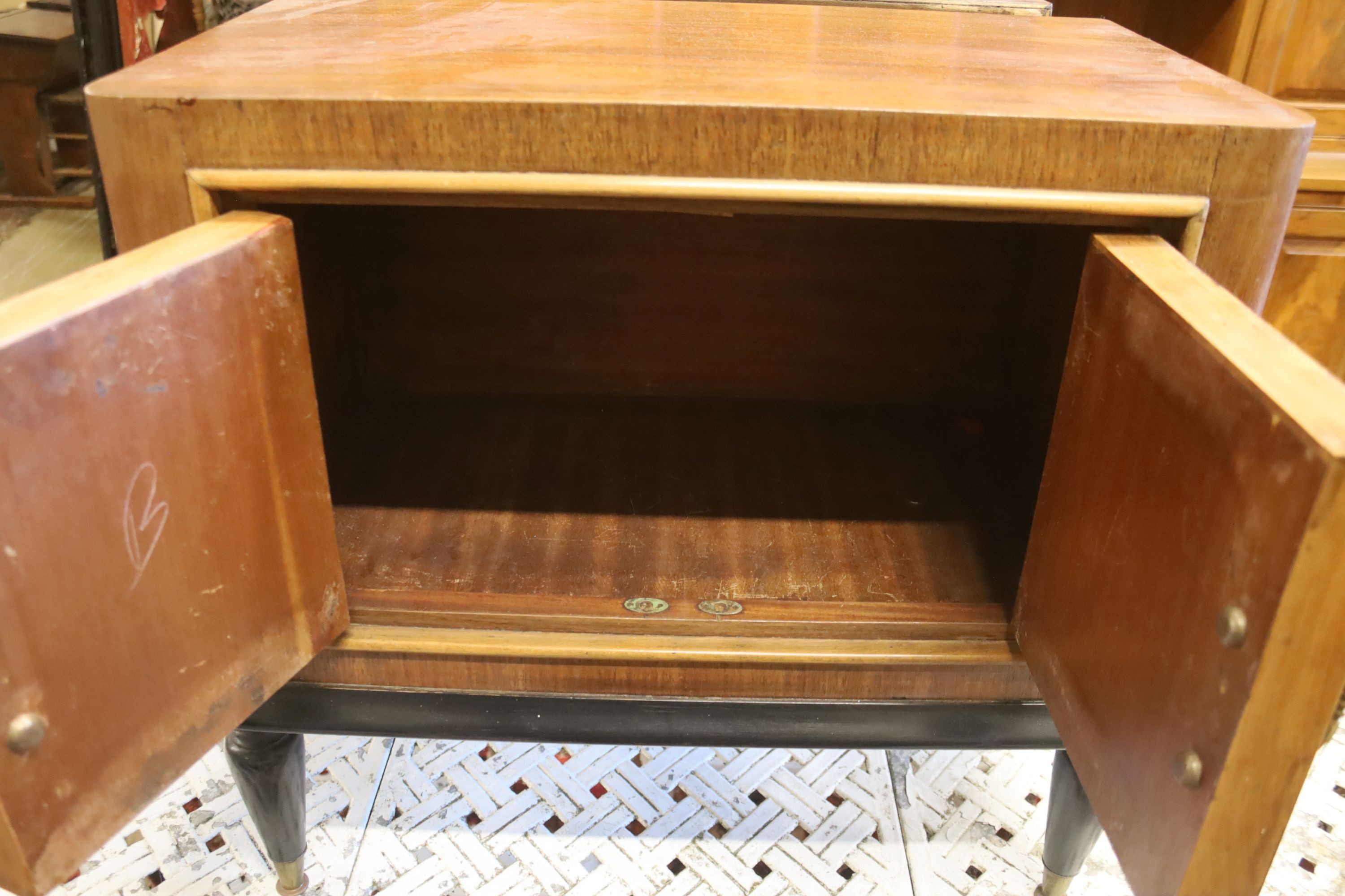 A pair of mid century part ebonised teak bedside cabinets, width 60cm, depth 33cm, height 57cm